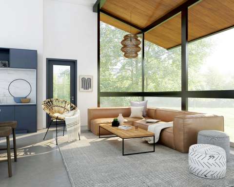 living room with brown sofa and glass window