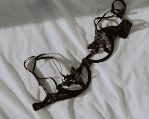 black leather strap on white textile