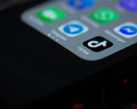 black iphone 4 on black textile