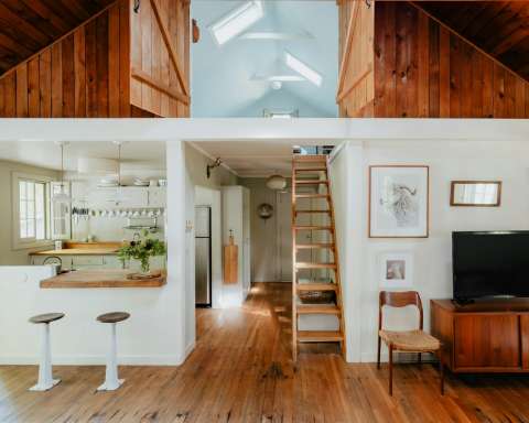 A split photo of a living room and kitchen
